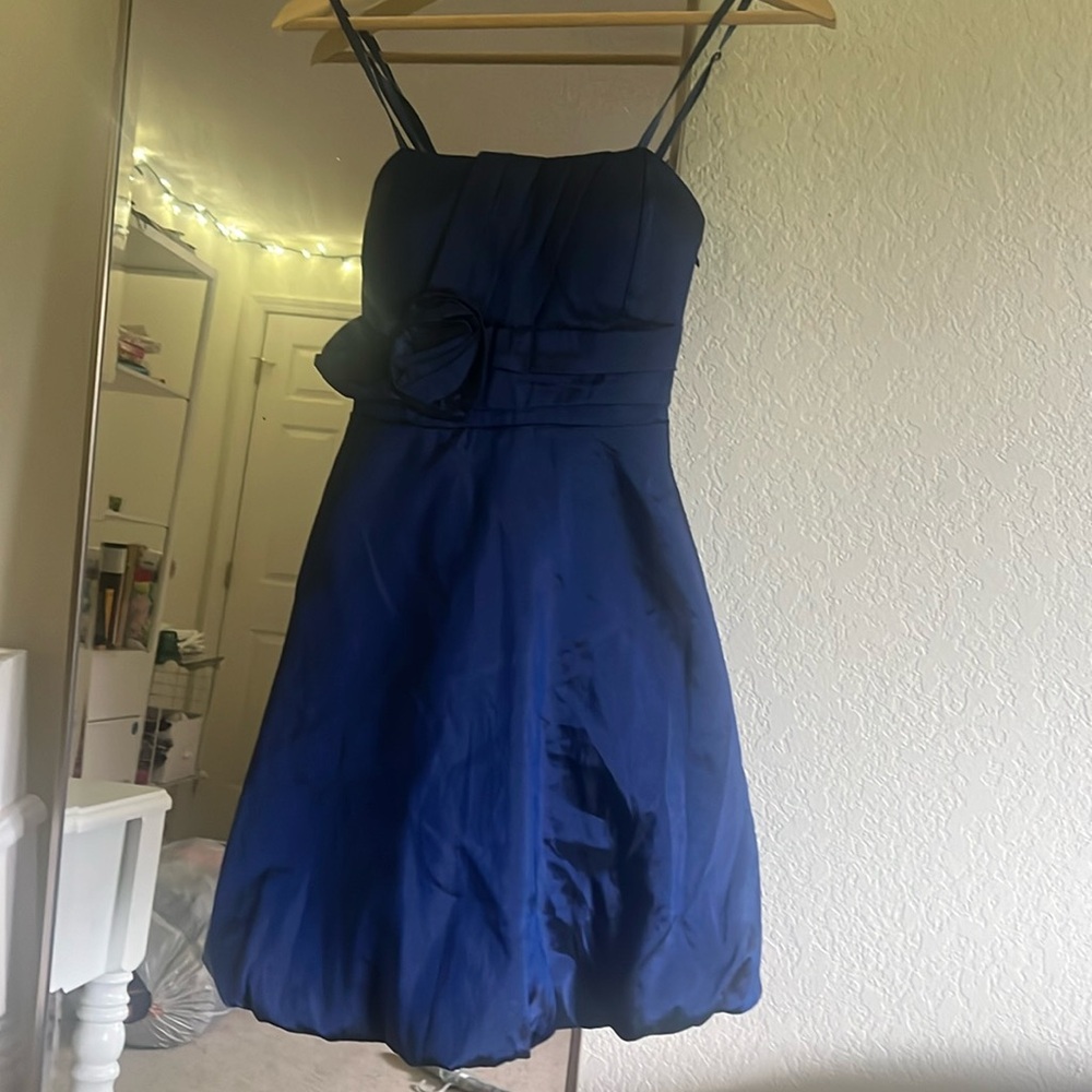 Elegant Navy Blue Dress with Floral Accent